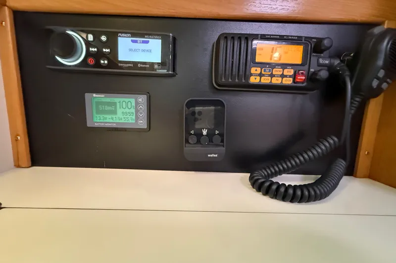 Slide: The Image of Control panel of a 2007 Catalina 34 MkII sailboat with radio and battery monitor. - 50