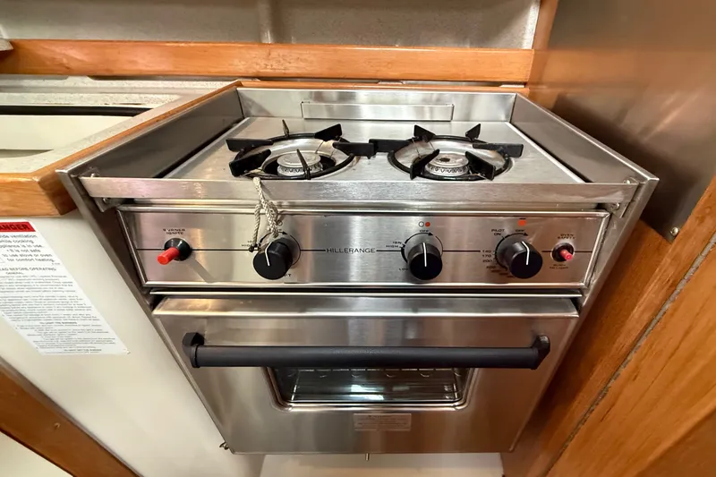 Slide: The Image of Stainless steel stove and oven in 2007 Catalina 34 MkII yacht kitchen. - 61