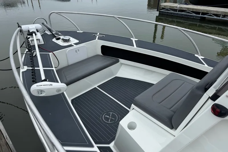Slide: The Image of 2021 Extreme Boats 745 Center Console 24' with sleek seating and modern design. - 11