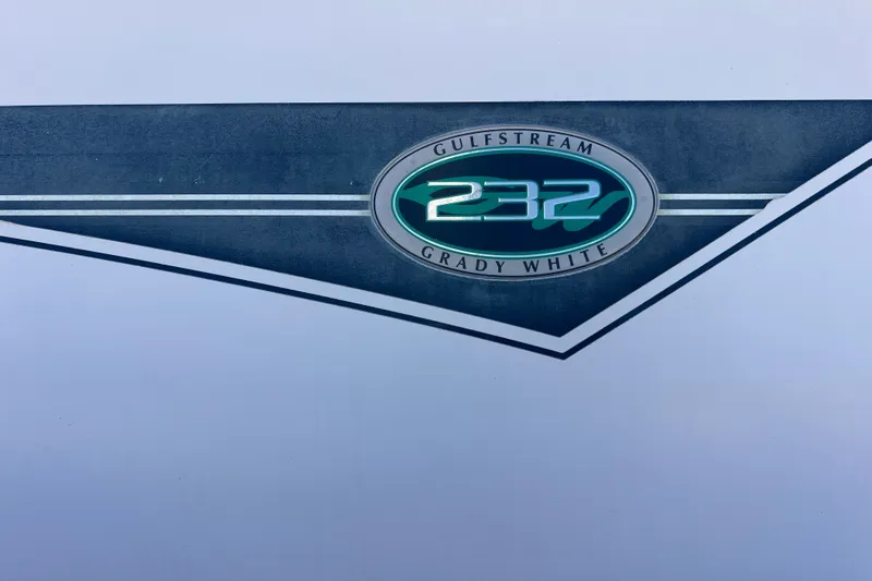 Slide: The Image of Grady-White Gulfstream 232 emblem on a 1996 model boat. - 23