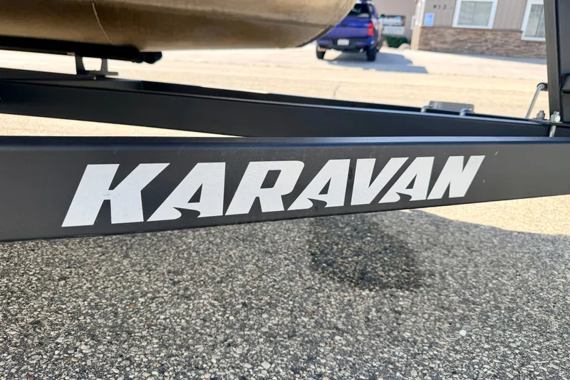 Slide: The Image of Karavan trailer for 2011 Palm Beach Sport Fish 1623 SE on asphalt. - 55