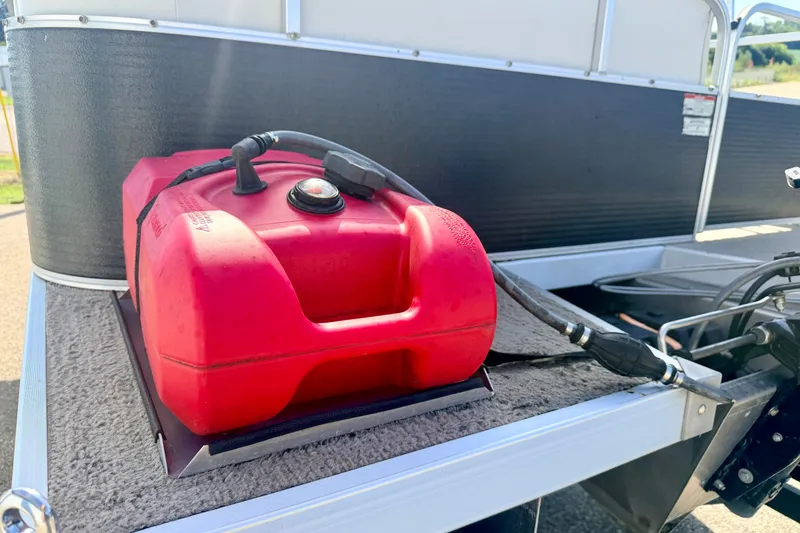 Slide: The Image of Red fuel tank on 2011 Palm Beach Sport Fish 1623 SE boat deck. - 19