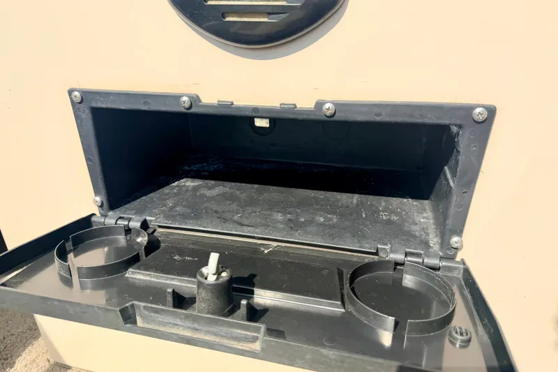 Slide: The Image of Open storage compartment on 2011 Palm Beach Sport Fish 1623 SE boat. - 48