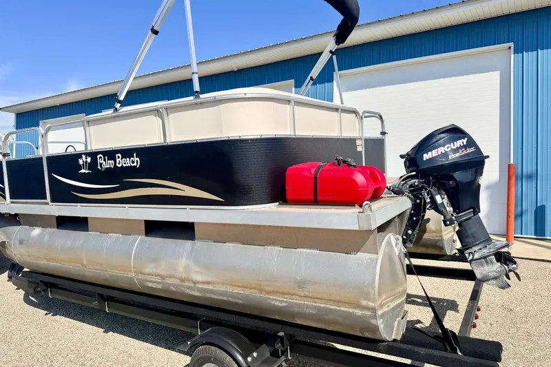 Slide: The Image of 2011 Palm Beach Sport Fish 1623 SE pontoon boat with Mercury outboard motor. - 14
