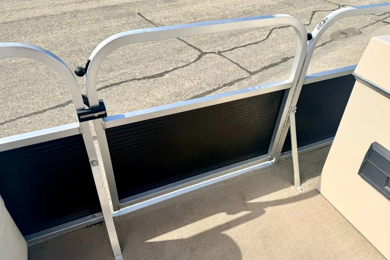Slide: The Image of Interior view of a 2011 Palm Beach Sport Fish 1623 SE boat railing and flooring. - 45