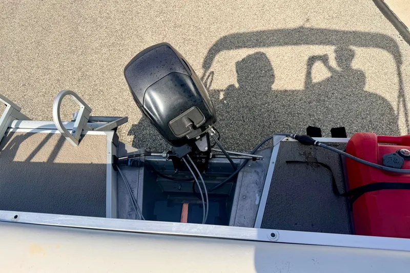 Slide: The Image of 2011 Palm Beach Sport Fish 1623 SE boat engine and deck with shadows. - 21