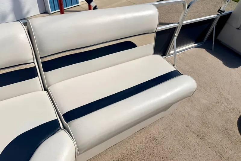 Slide: The Image of White and navy seating on 2011 Palm Beach Sport Fish 1623 SE boat. - 28