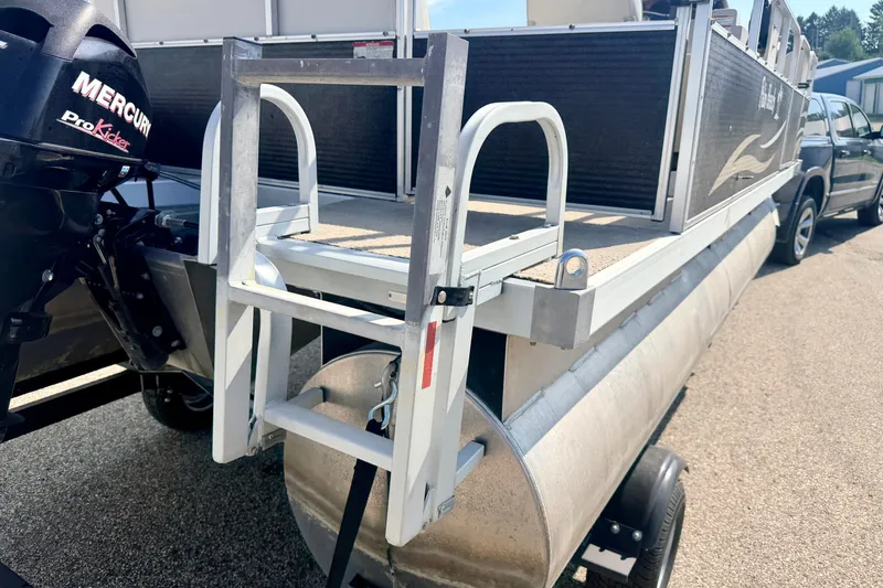 Slide: The Image of 2011 Palm Beach Sport Fish 1623 SE pontoon boat with Mercury ProKicker motor. - 16