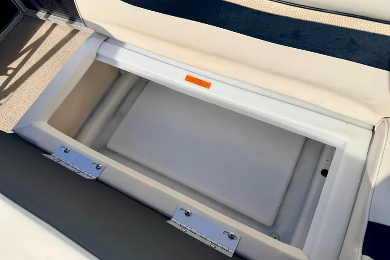Slide: The Image of Open storage compartment on 2011 Palm Beach Sport Fish 1623 SE boat. - 25