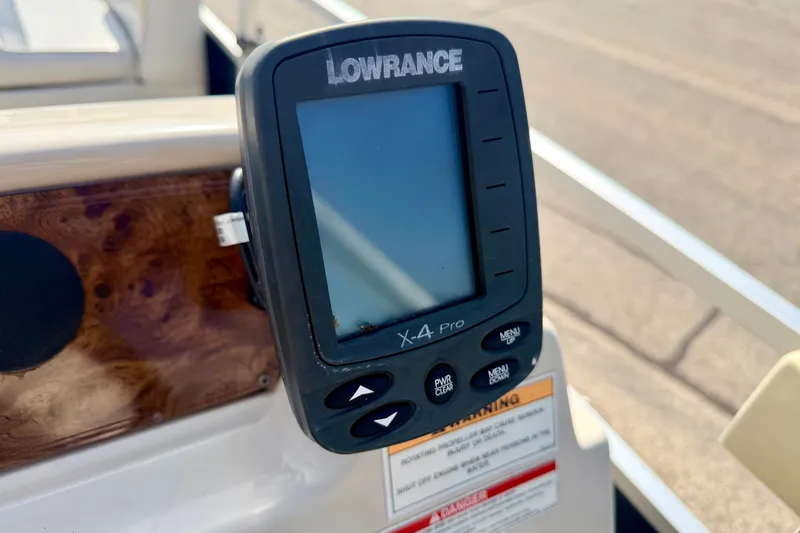 Slide: The Image of Lowrance X-4 Pro fish finder on 2011 Palm Beach Sport Fish 1623 SE boat. - 34