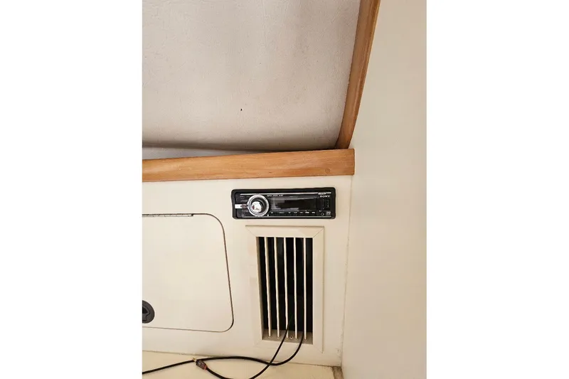 Slide: The Image of Interior of 2000 Albin 31 Tournament Express with stereo and vent. - 28