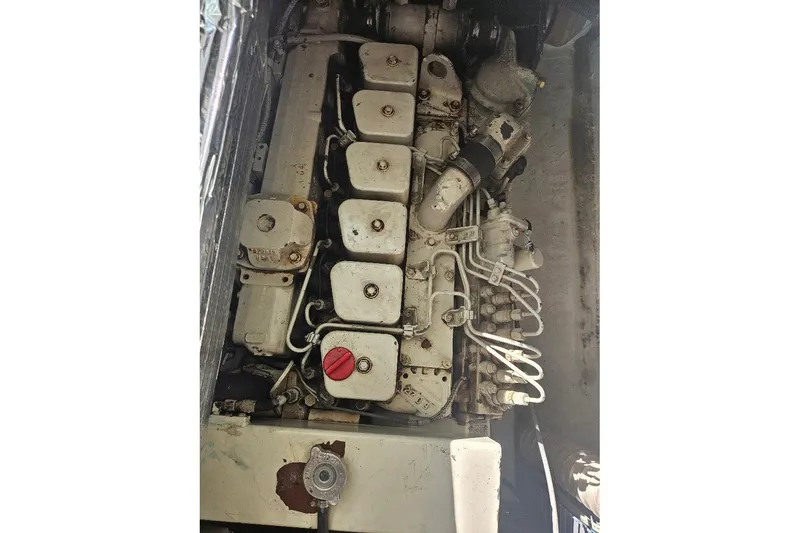 Slide: The Image of Engine of a 2000 Albin 31 Tournament Express boat, showcasing mechanical components. - 30