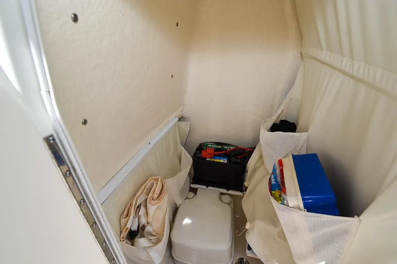 Slide: The Image of Interior of a boat with storage compartments and accessories. - 13