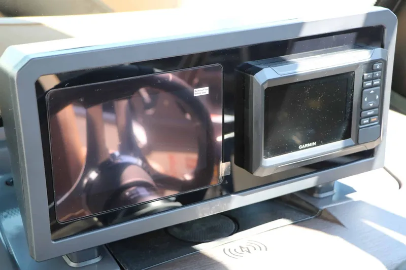 Slide: The Image of The image shows a modern helm with a Garmin navigation system. - 40