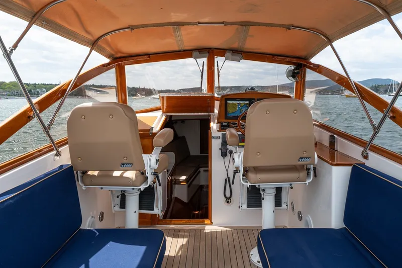 Slide: The Image of Interior view of 2000 CH Marine 38 Runabout boat with helm and seating. - 14