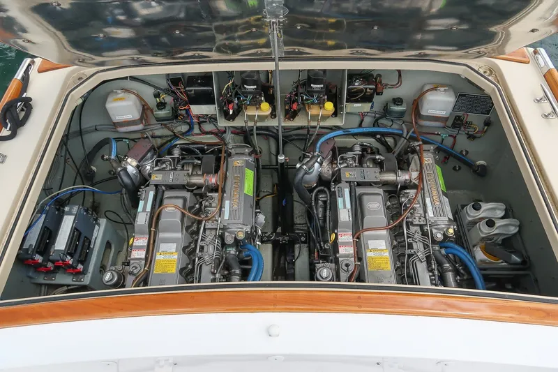 Slide: The Image of Engine compartment of 2000 CH Marine 38 Runabout with dual engines and wiring. - 33
