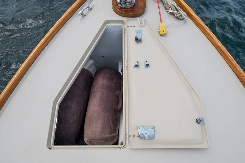 Slide: The Image of Storage compartment on CH Marine 38 Runabout boat, 2000 model, with cushions inside. - 23