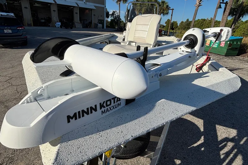 Slide: The Image of 2027 Ranger RB190 boat with Minn Kota Maxxum trolling motor in a sunny outdoor setting. - 5