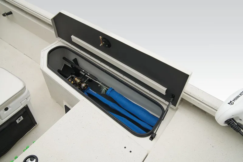 Slide: The Image of Manufacturer Provided Image: Manufacturer Provided Image: 2025 Ranger RB190 boat storage compartment with fishing rods and blue cover. - 41