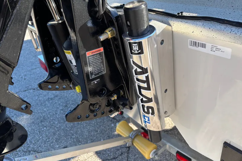 Slide: The Image of Close-up of a 2027 Ranger RB190 boat's Atlas hydraulic jack plate. - 2
