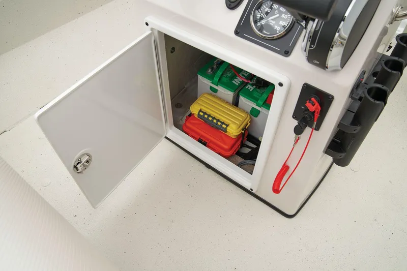 Slide: The Image of Manufacturer Provided Image: Manufacturer Provided Image: Open storage compartment in 2025 Ranger RB190 boat showing battery and equipment. - 51