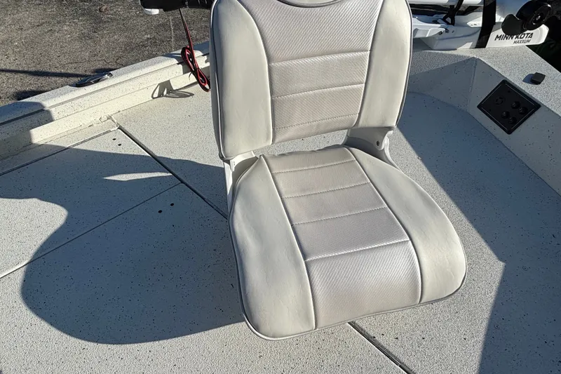 Slide: The Image of White seat on 2027 Ranger RB190 boat deck, featuring textured upholstery. - 8