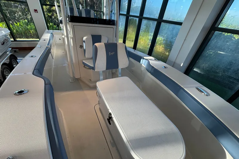 Slide: The Image of 2025 Ranger 2600 Bay boat interior with modern seating and sleek design. - 8