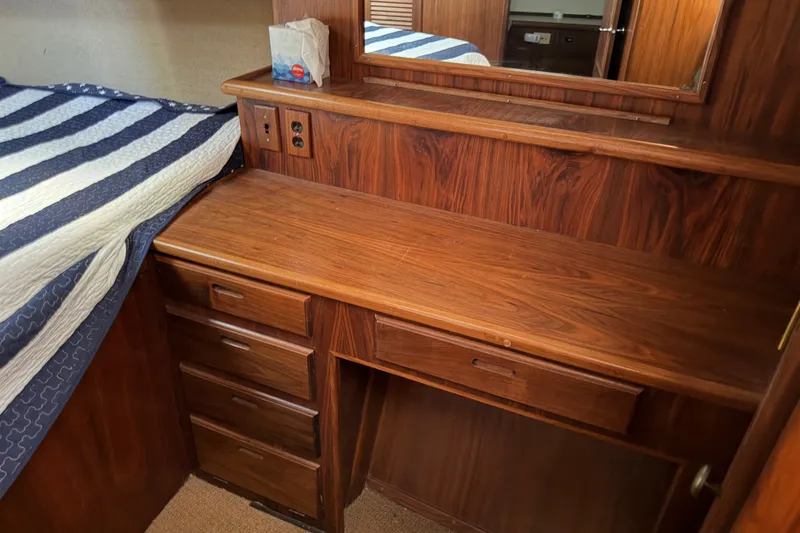 Slide: The Image of Wooden desk with drawers in 1984 Californian 43 Cockpit MY yacht interior. - 30