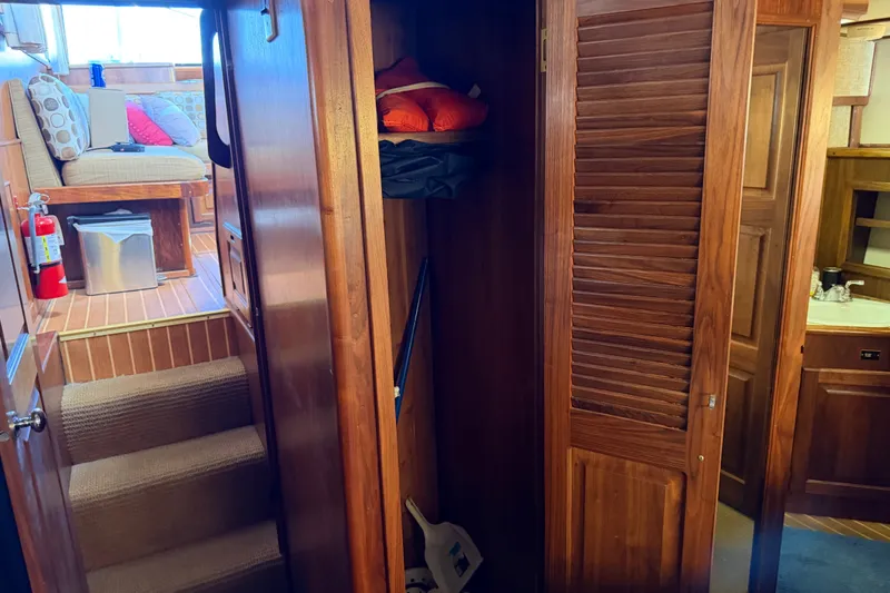 Slide: The Image of Interior of 1984 Californian 43 Cockpit MY yacht with wooden cabinetry and seating area. - 46
