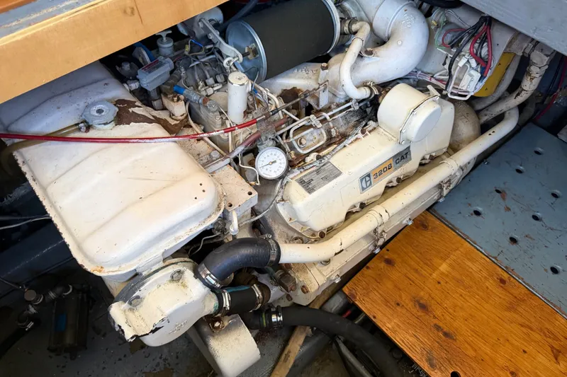 Slide: The Image of Engine room of 1984 Californian 43 Cockpit MY with CAT 3208 engine. - 54