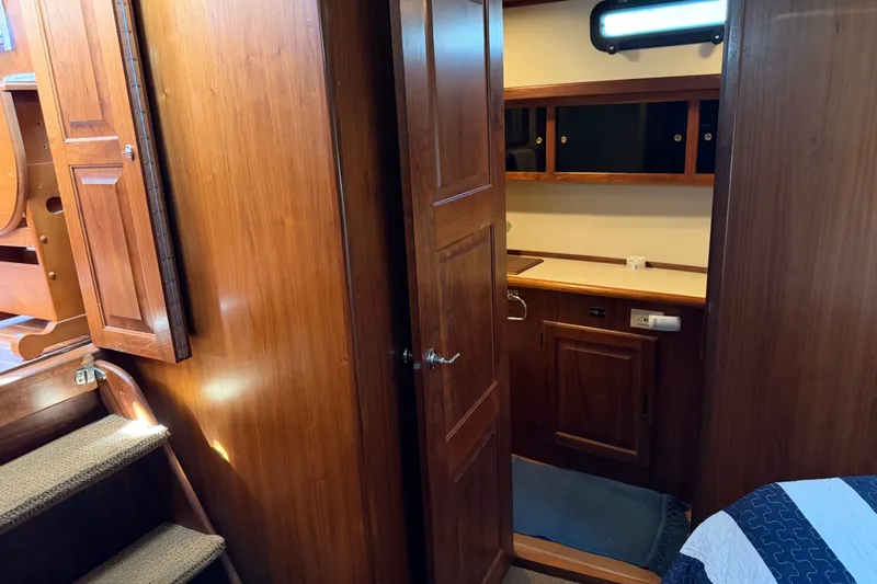 Slide: The Image of Interior of 1984 Californian 43 Cockpit MY yacht with wooden cabinetry and cozy staircase. - 31