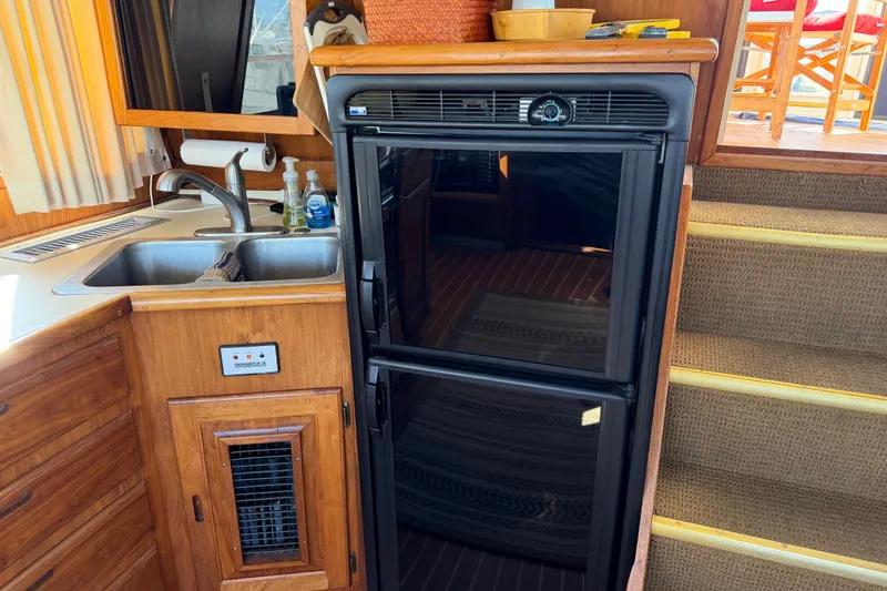 Slide: The Image of Interior of 1984 Californian 43 Cockpit MY yacht with kitchen sink and refrigerator. - 22