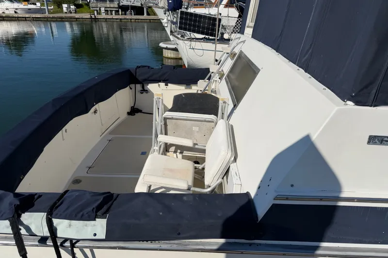 Slide: The Image of 1984 Californian 43 Cockpit MY yacht with spacious deck and seating area. - 64