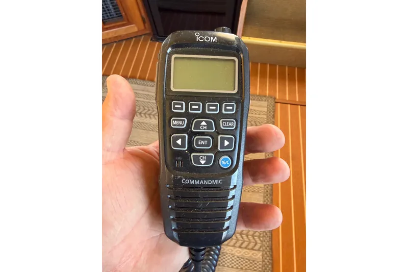 Slide: The Image of Hand holding ICOM CommandMic on 1984 Californian 43 Cockpit MY yacht. - 13