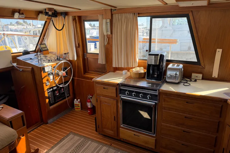 Slide: The Image of Interior of 1984 Californian 43 Cockpit MY yacht with kitchen and helm station. - 19