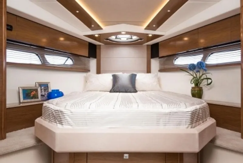 Slide: The Image of Manufacturer Provided Image: Luxurious bedroom interior of 2014 Cruisers Yachts 45 Cantius with modern decor. - 13