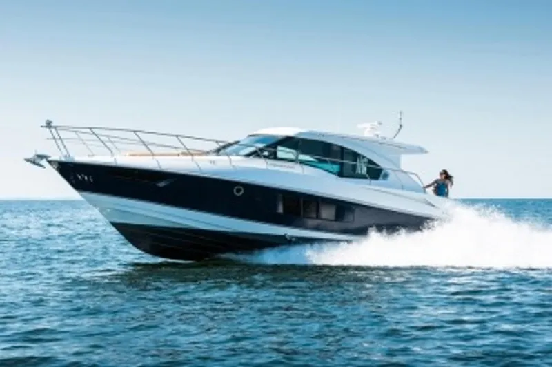 Slide: The Image of Manufacturer Provided Image: 2014 Cruisers Yachts 45 Cantius cruising on open water. - 2