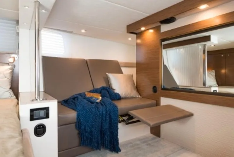 Slide: The Image of Manufacturer Provided Image: Luxurious interior of 2014 Cruisers Yachts 45 Cantius with cozy seating and modern decor. - 16