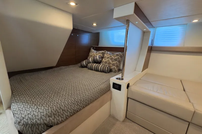 Slide: The Image of Luxurious cabin interior of 2014 Cruisers Yachts 45 Cantius with cozy bedding. - 26