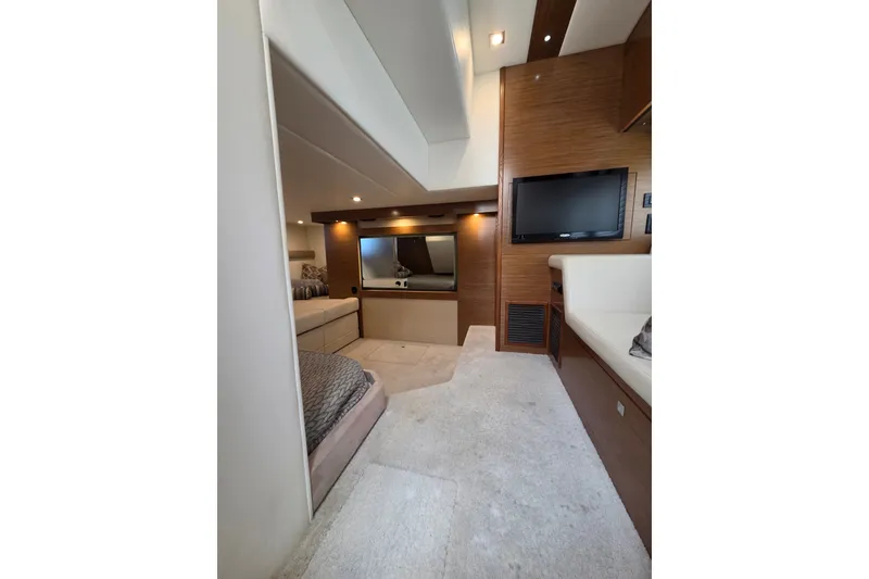 Slide: The Image of Luxurious interior of 2014 Cruisers Yachts 45 Cantius with modern furnishings and TV. - 28