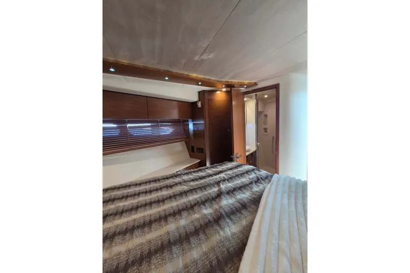 Slide: The Image of Luxurious interior cabin of 2014 Cruisers Yachts 45 Cantius with modern wood finishes. - 31