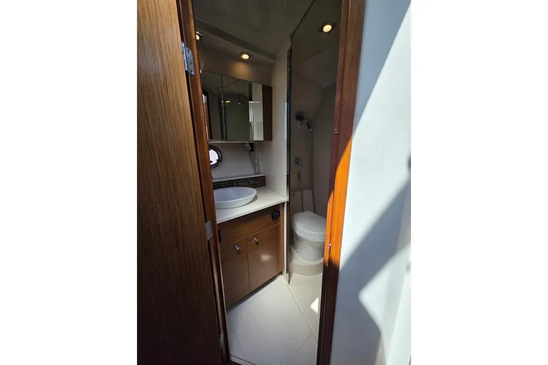 Slide: The Image of Luxurious bathroom interior of 2014 Cruisers Yachts 45 Cantius with modern fixtures. - 29