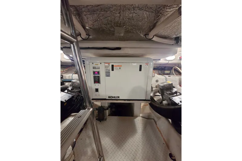 Slide: The Image of Engine room of 2014 Cruisers Yachts 45 Cantius with Kohler generator. - 43