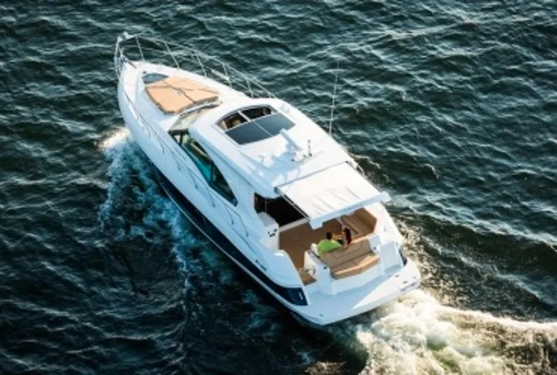 Slide: The Image of Manufacturer Provided Image: 2014 Cruisers Yachts 45 Cantius cruising on open water. - 3