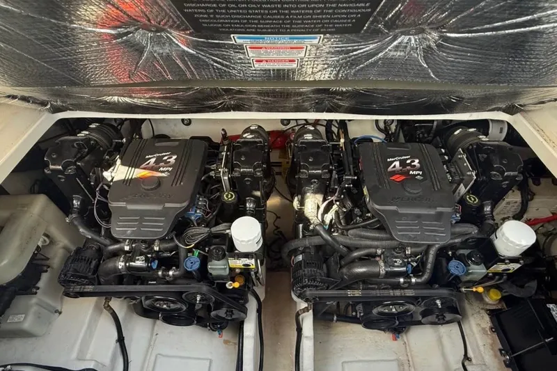 Slide: The Image of Twin MerCruiser 4.3 MPI engines in a 2005 Sea Ray Sundancer 280 boat. - 3