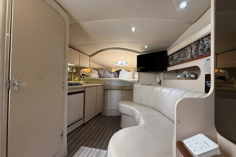 Slide: The Image of Interior of 1999 Cruisers Yachts 3075 Rogue with cozy seating and modern amenities. - 28