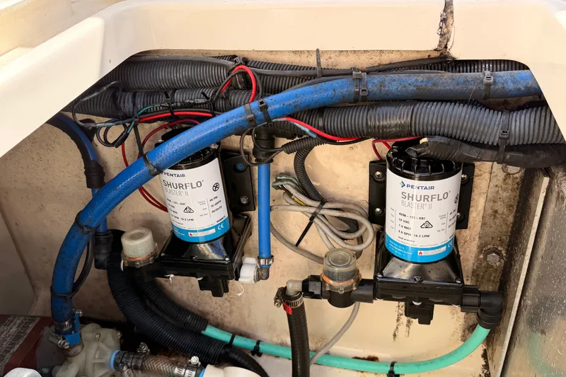 Slide: The Image of Boston Whaler 285 Conquest 2007 boat wiring and pump system with Shurflo components. - 49
