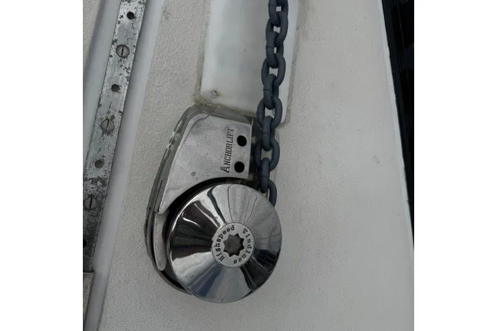 Slide: The Image of Anchor lift mechanism on a 1973 C&C 48 yacht with chain detail. - 38