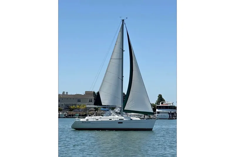 The Image of Sailing yacht Beneteau Oceanis 36 CC, 1998 model, on calm waters under clear skies. - 0