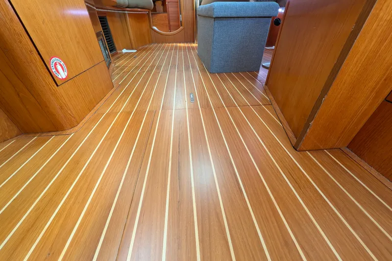 Slide: The Image of Interior view of 2006 Jeanneau Sun Odyssey 45 with polished wooden flooring. - 35